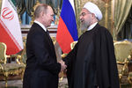 Владимир Путин и президент Ирана Хасан Роухани во время встречи в Кремле, 2017 год