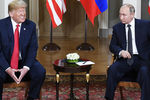 Президент США Дональд Трамп и президент России Владимир Путин во время встречи в Хельсинки, 16 июля 2018 года
