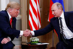 Президент США Дональд Трамп и президент России Владимир Путин во время встречи в Хельсинки, 16 июля 2018 года