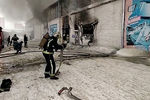 Тушение пожара на складе автозапчастей на улице Калинина в Красноярске, 3 февраля 2021 года