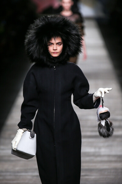 В&nbsp;модный дом Fendi дизайнера пригласили в&nbsp;1965 году, и впоследствии он заключил с&nbsp;компанией пожизненный контракт (такой же у&nbsp;него был и с&nbsp;Chanel). Римский бренд с&nbsp;самого начала специализировался на&nbsp;изделиях из&nbsp;меха — Лагерфельд и здесь нашел место для&nbsp;эксперимента, принявшись стричь, красить и всячески преображать исходный материал. В&nbsp;2014 году сильным ходом стало эксклюзивное предложение — брелок с&nbsp;мехом норки, лисы и козла, его вынесла на&nbsp;подиум на&nbsp;показе Кара Делевинь. Спустя месяц в&nbsp;листе ожидания на&nbsp;покупку аксессуара оказалось 600&nbsp;имен, хотя стоил он более $1,6 тыс.