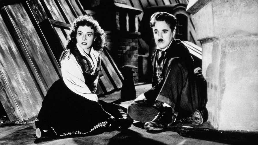 Чарли Чаплин и Полетт Годдар в фильме «Великий диктатор» (1940)