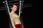 Модель на показе в рамках Недели моды Mercedes-Benz Fashion Week Russia в ЦВЗ «Манеж» в Москве