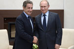 Экс-президент Франции, лидер французской оппозиционной партии «Республиканцы» Николя Саркози и президент России Владимир Путин во время встречи в резиденции «Ново-Огарево»
