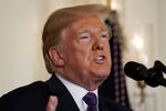 Президент США Дональд Трамп в Белом доме во время заявления о нанесении ударов по целям в Сирии, 14 апреля 2018 года