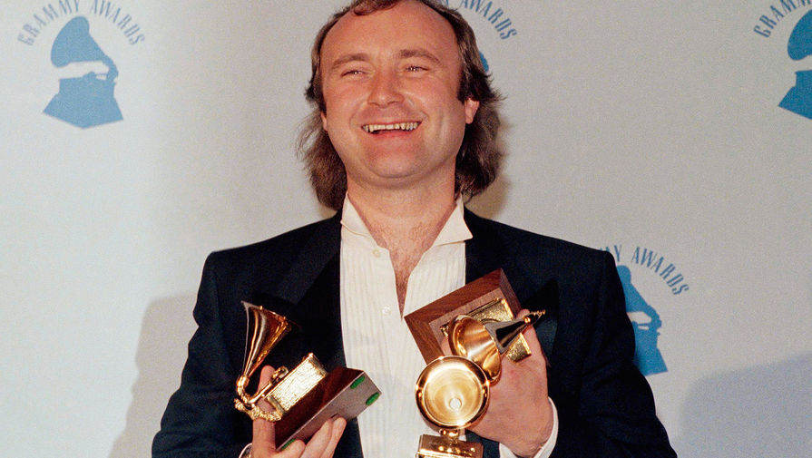 За&nbsp;20 лет существования Genesis выпустила 12&nbsp;альбомов и завоевала популярность во всем мире. Группа продала более 150&nbsp;млн копий альбомов (из них около&nbsp;22 млн &mdash; в&nbsp;США). Кроме ударных и вокала Фил Коллинз занимался написанием песен, индивидуальным творчеством и работал с&nbsp;джазовым инструментальным коллективом Brand X. На&nbsp;фото: Коллинз на&nbsp;церемонии вручения &laquo;Грэмми&raquo; в&nbsp;Лос-Анджелесе в&nbsp;1986 году, где он получил три награды &mdash; за&nbsp;лучший альбом, как лучший поп-вокалист и продюсер года