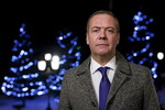 Заместитель председателя Совета безопасности РФ, председатель партии «Единая Россия» Дмитрий Медведев поздравляет россиян с Новым годом, 2024 год