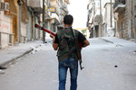 24&nbsp;сентября. Сирийский повстанец на&nbsp;улице Алеппо.