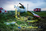 На месте крушения рейса MH17 Malaysia Airlines 17 июля 2014 года