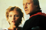 Мишель Пфайффер и Рутгер Хауэр в фильме «Леди-ястреб» (1985)