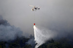 Пожарный вертолет в&nbsp;районе провинции Хатай на&nbsp;юго-востоке Турции.