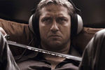 Кадр из фильма «Рок-н-рольщик» (2008)