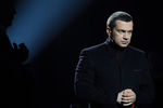 Ведущий Владимир Соловьев во время предвыборных теледебатов кандидатов в президенты РФ Михаила Прохорова и Владимира Жириновского на канале Россия 1, 2012 год