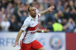 Игрок «Спартака» Денис Глушаков радуется забитому мячу в ворота ЦСКА в матче 26-го тура чемпионата России по футболу 