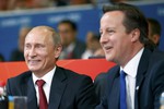 Путин и Кэмерон увлечены схваткой Хайбулаева против немца Петерса