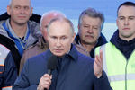 Президент России Владимир Путин на церемонии открытия движения по железнодорожной части Крымского моста через Керченский пролив на станции «Тамань пассажирская», 23 декабря 2019 года