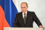 Президент России Владимир Путин во время оглашения ежегодного послания президента Российской Федерации Федеральному собранию в Георгиевском зале Кремля