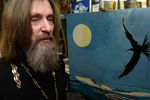 Федор Конюхов с одной из своих картин, 2014 год