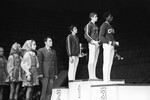 Спортсмены А. Пушкаш (Венгрия), Александр Дитятин (СССР) и Р. Ричардс (Куба) (слева направо), занявшие три первых места на международных соревнованиях по спортивной гимнастике, 1975 год