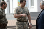 Глава самопровозглашенной ЛНР Валерий Болотов и глава штаба КПРФ по оказанию помощи юго-востоку Украины Казбек Тайсаев после пресс-конференции в Донецке Ростовской области России, 7 августа 2014 года