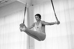 Александр Дитятин выполняет один из самых сложных элементов на кольцах — угол с крестом, 1980 год
