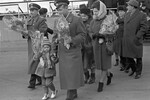 Встреча космонавтов Павла Беляева и Алексея Леонова на аэродроме Внуково после успешного завершения полета на космическом корабле «Восход-2». На фото: Павел Беляев, Алексей Леонов с дочерью Викой, за ними Татьяна Беляева и Светлана Леонова, Первый секретарь ЦК КПСС Леонид Брежнев (справа на заднем плане), 23 марта 1965 года