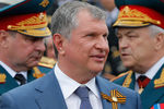 Глава «Роснефти» Игорь Сечин во время визита президента России Владимира Путина в Севастополь, май 2014 года