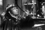 <b>«Шинель», Алексей Баталов (1959)</b>
<br><br>
В режиссерском дебюте Алексея Баталова по повести Николая Гоголя «Шинель» Быков сыграл главную роль — «маленького» человека Акакия Акакиевича Башмачкина, который делает себя заложником мечты о вещи. Эту роль Быков сыграл, еще работая главным режиссером Ленинградского театра имени Ленинского комсомола.