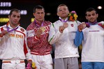 Власов выиграл золото на своей первой Олимпиаде