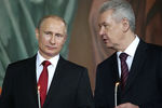 Владимир Путин и Сергей Собянин на праздничном пасхальном богослужении в храме Христа Спасителя, апрель 2014 года