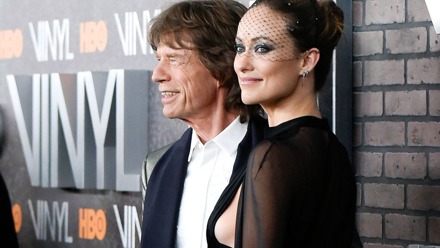 Музыкант Мик Джаггер и актриса Оливия Уайлд на премьере музыкальной драмы «Винил» в Нью-Йорке