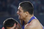 Последнее золото российских борцов выиграл «классик» (в синем) Алексей Мишин в категории до 84 кг