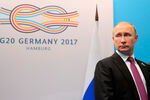 Президент РФ Владимир Путин перед началом беседы с президентом Турции Реджепом Тайипом Эрдоганом на полях саммита лидеров «Группы двадцати» в Гамбурге, 8 июля 2017 года