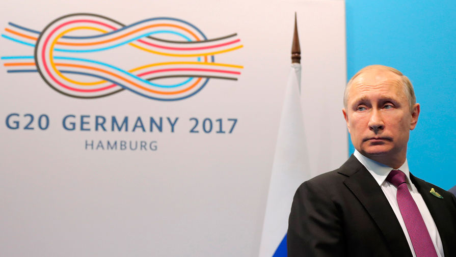 Президент РФ Владимир Путин перед началом беседы с президентом Турции Реджепом Тайипом Эрдоганом на полях саммита лидеров «Группы двадцати» в Гамбурге, 8 июля 2017 года