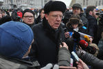 Бывший министр финансов России Алексей Кудрин отвечает на вопросы журналистов на санкционированном митинге оппозиции «За честные выборы» на проспекте Академика Сахарова в Москве, 2011 год
