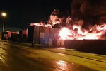На месте пожара в промзоне в Пушкинском районе Санкт-Петербурга, 3 декабря 2019 года. Кадр из видео