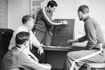 Тренер Анатолий Тарасов с членами сборной команды по хоккею во время разбора игры (у доски — Валерий Харламов), 1969 год
