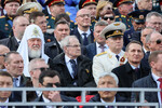 Патриарх Московский и всея Руси Кирилл, председатель Конституционного Суда РФ Валерий Зорькин, генеральный прокурор Игорь Краснов, директор Службы внешней разведки РФ Сергей Нарышкин на параде в Москве, посвященном 78-й годовщине Победы в Великой Отечественной войне