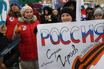 Участники митинга-концерта «Россия в моем сердце!» на Васильевском спуске в Москве