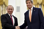 Российский президент Владимир Путин и госсекретарь США Джон Керри