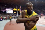 Усэйн Болт выиграл забег с олимпийским рекордом