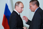 Президент России Владимир Путин и министр экономического развития Алексей Улюкаев в Турции, 10 октября 2016 года