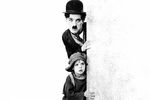 Чарли Чаплин и Джеки Куган в фильме «Малыш» (1921)