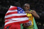Болт и бронзовый призер американец Джастин Гэтлин