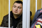Сотрудник МВД Алексей Смирнов, обвиняемый в убийстве и тяжелом ранении сотрудников полиции на станции метро «Рязанский проспект», перед рассмотрением ходатайства следствия об аресте в Пресненском районнм суде, 20 сентября 2019 года
