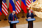 Президент США Дональд Трамп и президент России Владимир Путин во время пресс-конференции по итогам встречи в Хельсинки, 16 июля 2018 года