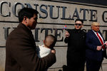 Howard, 37, an Australian-Chinese who is impersonating North Korean leader Kim Jong-un, and Dennis Alan of Chicago, 66, who is impersonating U.S. President Donald Trump, pose outside U.S. Consulate in Hong Kong, China January 25, 2017. REUTERS/Bobby Yip