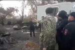 Подозреваемый в совершении поджога в двухэтажном жилом доме №13 на улице Ленинской во время задержания
