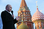 Владимир Путин на митинге-концерте «Мы вместе», посвященном годовщине присоединения Крыма к России, на Васильевском спуске