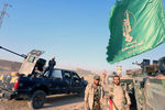 Ополченцы коалиции Сил народной мобилизации (PMF) и иракские военнослужащие в Киркуке, 16 октября 2017 года
